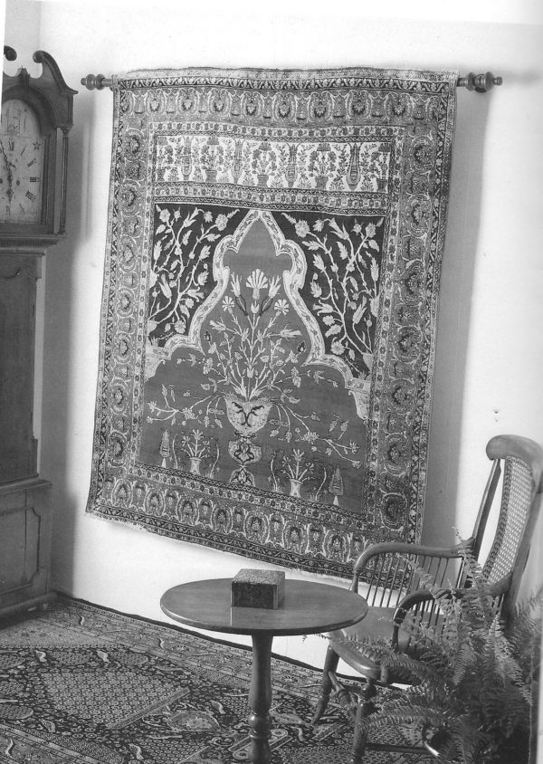 Persian Rug Hanged In The Wall.