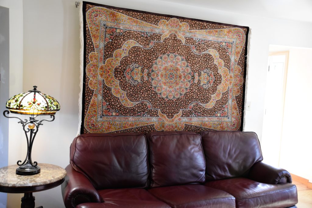 Persian Rug Hanged In Wall