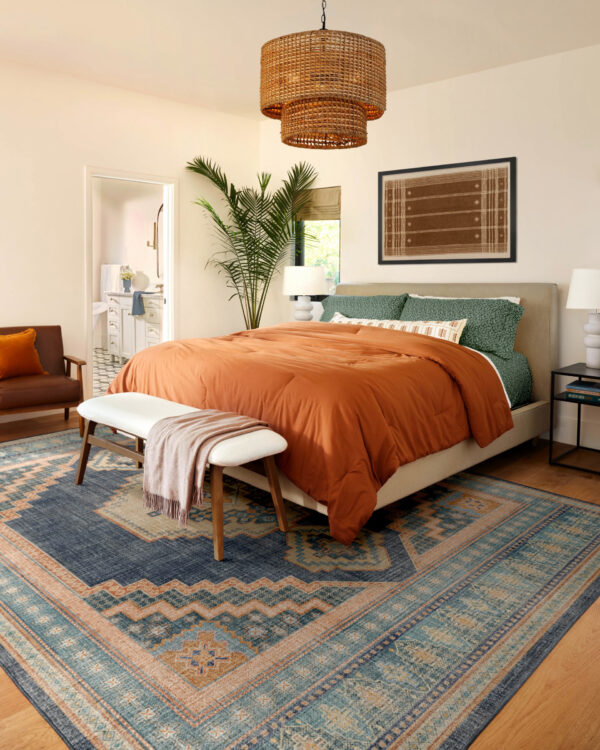 A bedroom with a washable Persian rug in a perfect size and shape