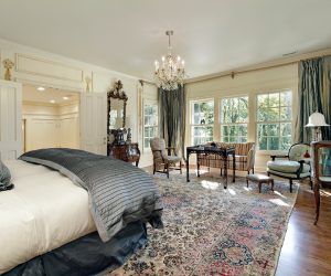 Master bedroom in luxury home with sitting room